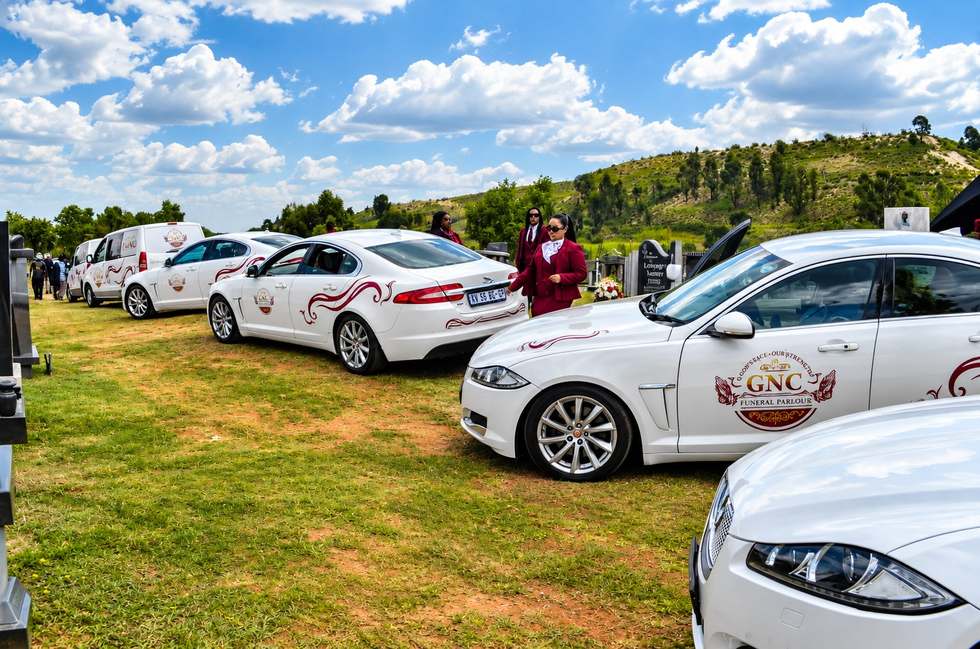 GNC Funeral Parlour hearse and family car fleet